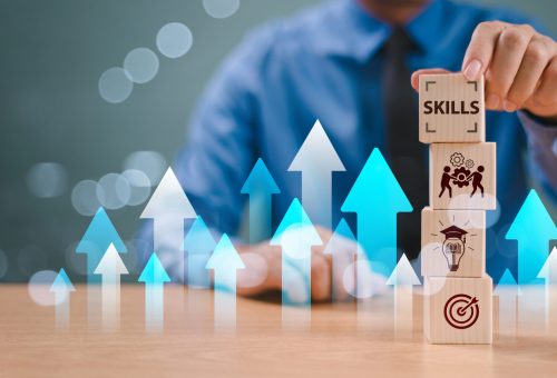 skill competency development concept. up new ability skill training for technology evolution. leadership thinking upskill. hand hold wooden cube, soft skill digital icon. education learning talent